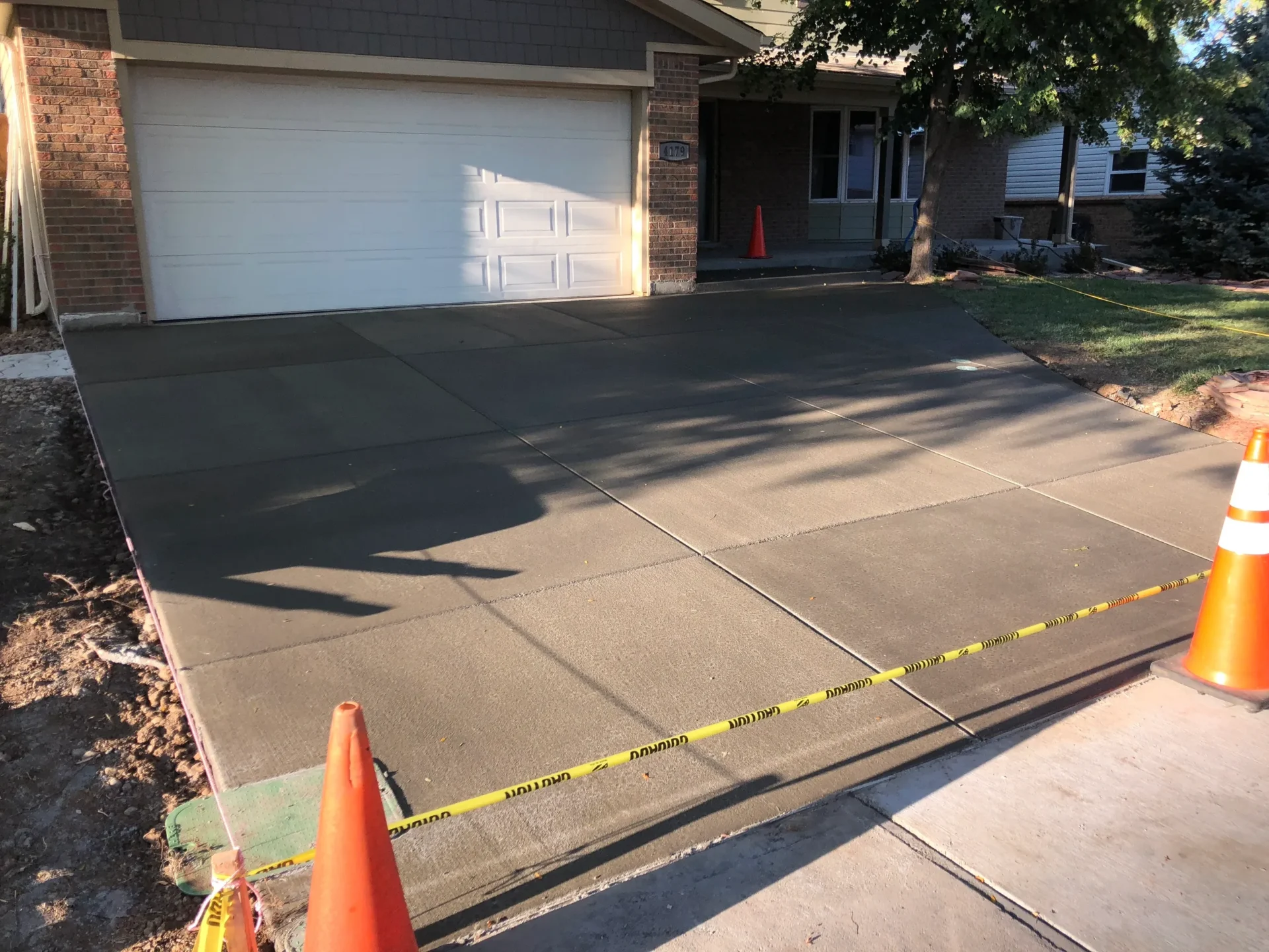 A driveway with a yellow line on it